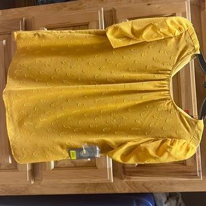 a mustard vince camuto blouse.